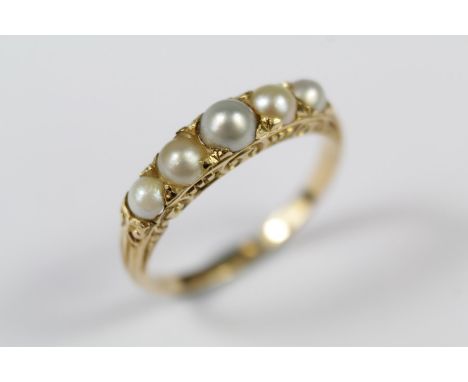 An Antique 18ct Yellow Gold Pearl Ring. The ring size L, approx 2.4 gms. (single pearl replaced)