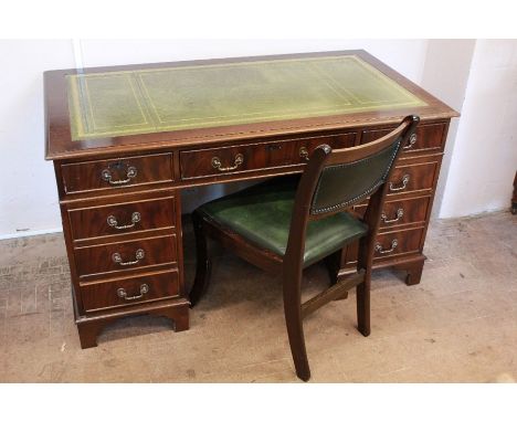 A Mahogany Office Suite. The lot includes a twin pedestal desk with tooled green leather top, approx 136 w x 77 d x 75 h cms 