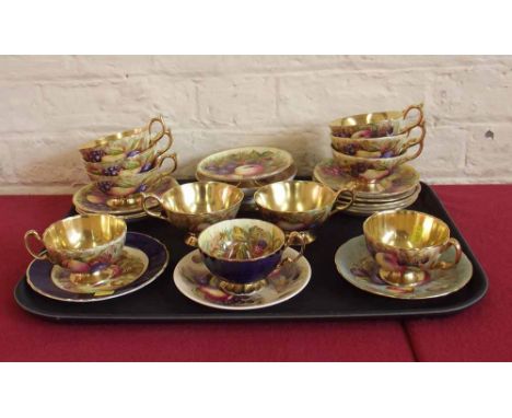 Ten Aynsley cups and saucers decorated with fruit, plate, two small bowls and a cup. Condition report: see terms and conditio