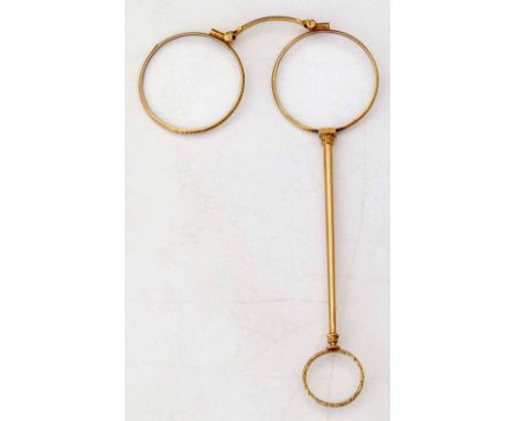 French 18K gold lorgnette (eagle's head)  maker SL, the carved frames on a plain shaft with release mechanism, overall length