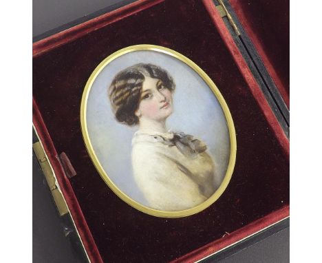 Early 20th century school - bust portrait of a young lady, oil, oval mount, 4.75" x 3.5", set within a folding leather case