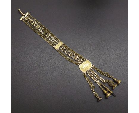 Good 19th century yellow gold chatelaine, with oval and belcher links over a canted rectangular engraved panel with four mini