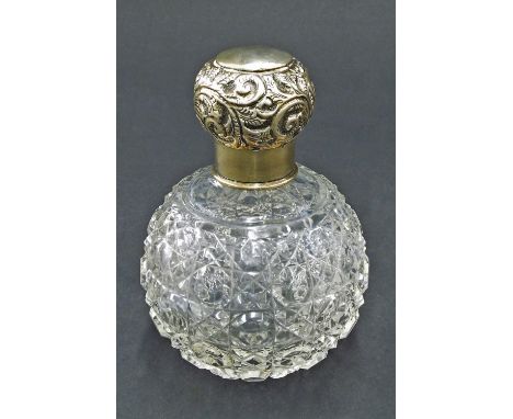 Silver lidded cut glass globe shaped scent bottle with stopper, 4" high