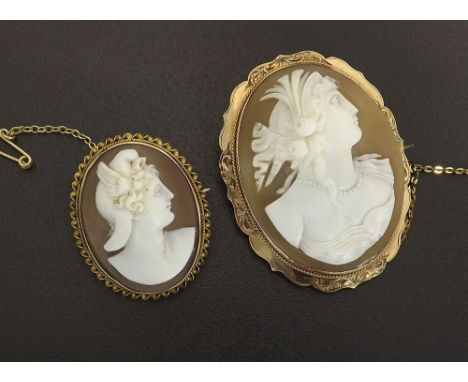 9ct mounted oval cameo brooch depicting a profile portrait of a lady with a floral headdress, with safety chain, 51mm x 40mm;