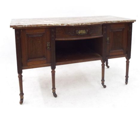 Edwardian walnut and oak marble top bow fronted washstand fitted with a single bowed drawer over recessed shelved area flanke