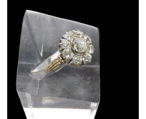 Good quality and impressive diamond cluster ring, with old-cut diamonds on a yellow gold shank, the centre diamond 0.80ct app