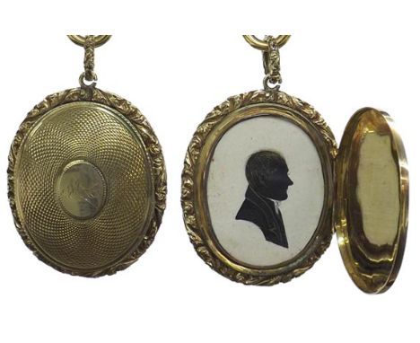 19th century gold engine turned oval locket pendant, inset with a silhouette profile of a gentleman within an engine turned a