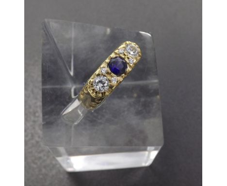 (3GNNNB) 9ct synthetic sapphire and cz yellow gold dress ring, 4.6gm, ring size J/K