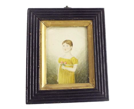 English School - half length primitive portrait of a girl in a yellow dress holding flowers, watercolour, 3.5" x 2.5", framed