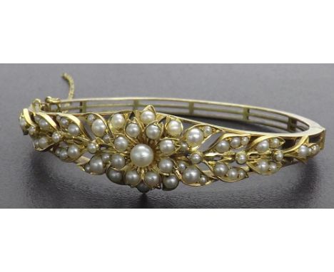 Victorian gold pearl set floral design bangle, unmarked, 24gm
