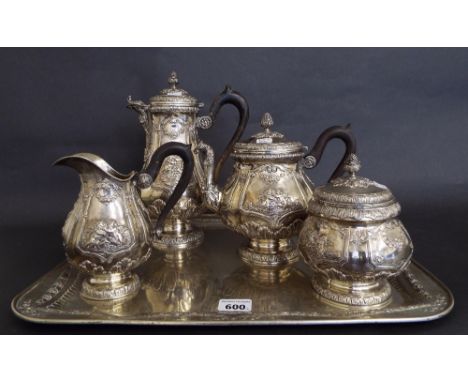 Four piece German Hanau (800) silver tea service comprising teapot, water pot, milk jug and sucrier, all embossed with panels