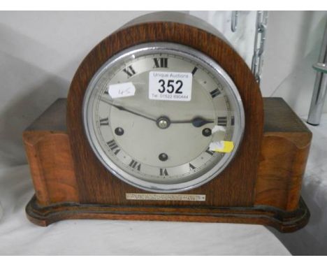 A vintage mantel clock in working order. 