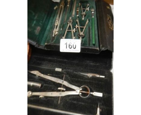 A quantity of mathematical tools including drawing compasses etc.