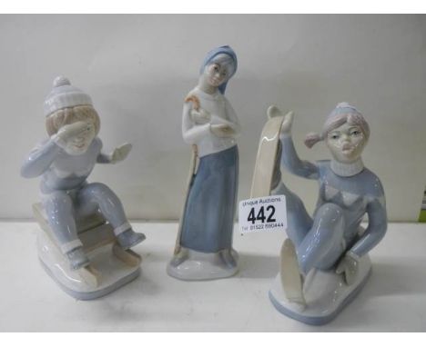 Three Lladro style figures. 