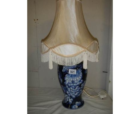 A good quality pottery table lamp with shade. 