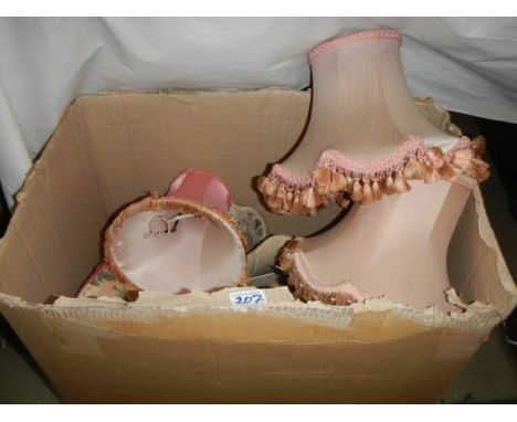 A box of assorted lamp shades. 