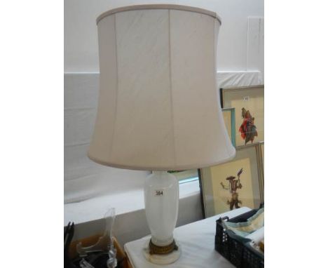 A ceramic table lamp. 