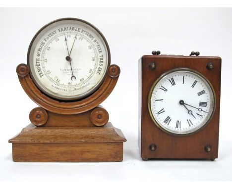 A V &amp; M Lepetit, Paris Aneroid Barometer, with black letting in a circular brass case, on carved oak stand, 12cm diameter