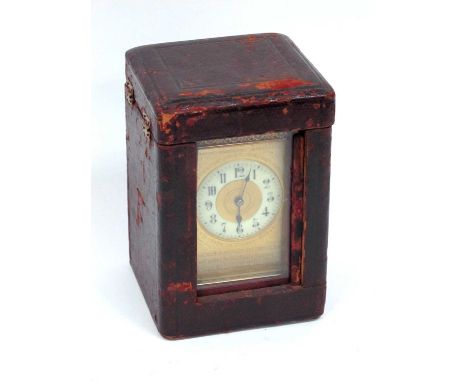 A Late XIX Century French Brass Cased Carriage Clock, cast with floral bands, the face with cream enamel chapter ring with Ar