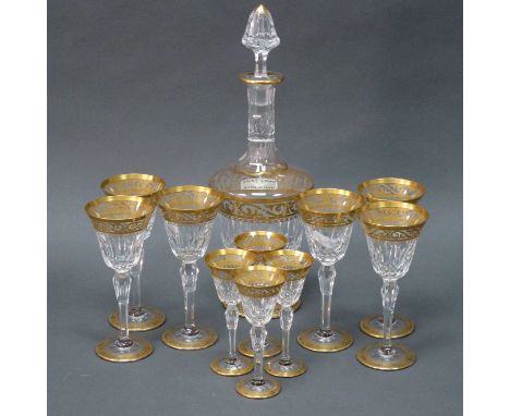 A St Louis, France Part Table Suite of Glassware, each decorated with scrolling gilt bands and cut decoration, etched marks a