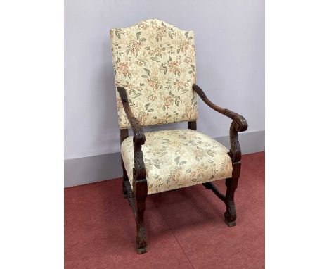 A XIX Century Mahogany Open Armchair, with upholstered back and seat, shaped scroll carved arms, raised on carved and block s