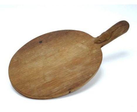 A Robert Thompson 'Mouseman' Cheese Board, with carved signature mouse to handle, 39.5cm long.