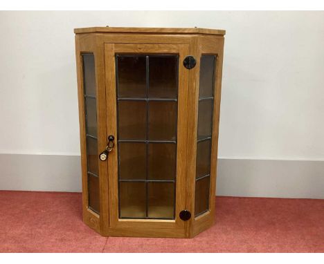 Robert Thompson 'Mouseman' Oak Flat Fronted Corner Cupboard, with leaded glazed door and sides, three glass shelves, with car