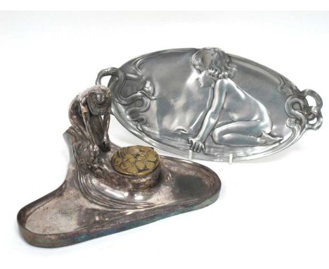 An Art Nouveau Pewter Two Handled Oval Dish, moulded with a kneeling naked child before a snail and sinuous lines, 28cm long 