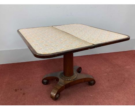 A XIX Century Rosewood Card Table, with fold-over top on tapering trefoil pedestal, scroll feet, 91cm wide.