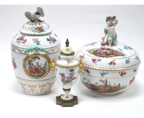 A Berlin Porcelain Circular Bowl and Cover, with kneeling cherub finial, moulded with bands of basketwork and decorated vigne