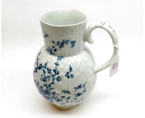 An 18th Century Worcester Dutch Jug, decorated with cabbage leaf and blue floral decoration, 8 ½” high (some restoration appa