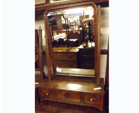 A 19th Century Mahogany Veneered Dressing Table Mirror, with three drawer base, raised on bracket feet, 16 ½” wide 