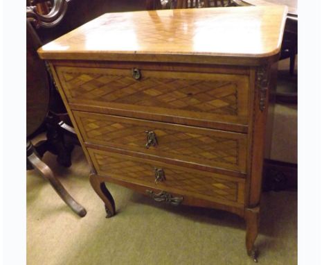 An unusual late 19th Century Continental Dressing Cabinet with flip top lid with bevelled interior mirror and fabric lining, 