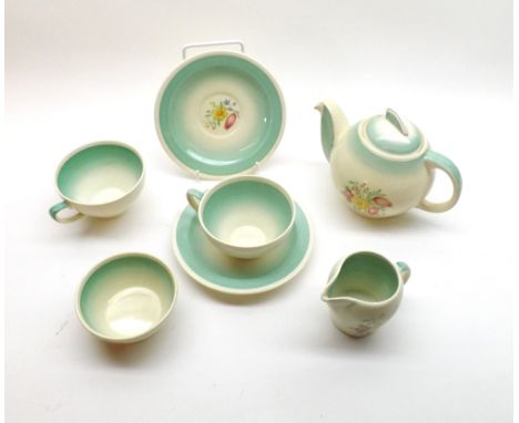 A small Susie Cooper floral decorated tea service comprising teapot, cream jug, sugar basin and two cups and saucers, largest