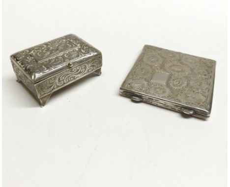 A Mixed Lot comprising: a continental white metal Powder Compact of hinged square form, the lid decorated with flowers, marke
