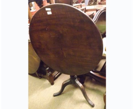 A Georgian Mahogany Table, the round snap top raised on a bobbin turned pedestal and tripod base, 29” wide 