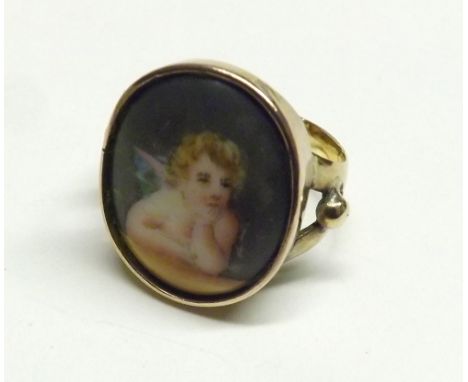 Edwardian hallmarked 18ct Gold ring set with a portrait panel of a cherub (worn), hallmarked for Birmingham 1906