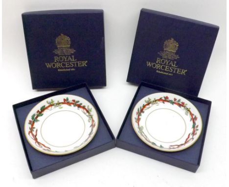 Two modern Royal Worcester Saucers in original Boxes, 4 ½” diam