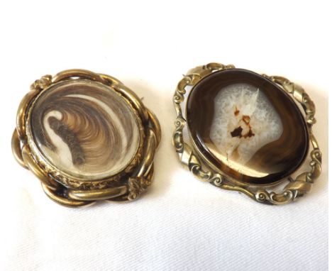 Two Victorian large Pinchbeck Brooches, one with Agate panel (cracked), the other with Hair Panel front and Photographic Port