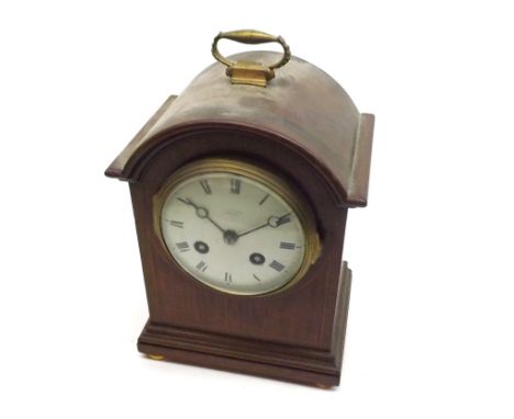 An Edwardian Mahogany and Inlaid Arched Cased Mantel Clock, the indistinctly signed 4&rdquo; white enamel dial with Roman num