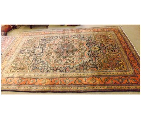 A large Modern Wool Carpet, multi-gull border, central panel of lozenges etc, mainly orange, blue and pale green field, 10’ x