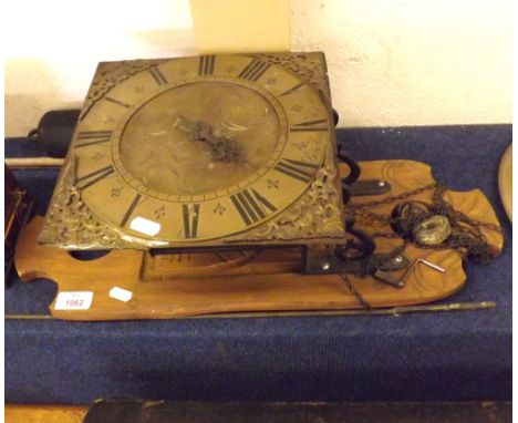 A Brass faced Wall Clock (movement probably formerly in a Long Case Clock), the square Brass face with circular black Roman c