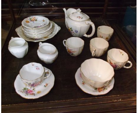 A Royal Crown Derby Floral Decorated Tea Set comprising: Teapot, two Jugs, five Cups, Saucers, Side Plates, Sugar Basin and d