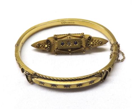 Mixed lot comprising late Victorian hallmarked 15ct Gold hollow bangle with curved front panel featuring three small Diamonds