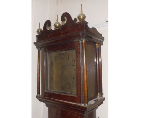 An Oak Longcase Clock 18th/19th Century, the square Brass dial with Arabic chapter ring, swan neck pediment with three ball f