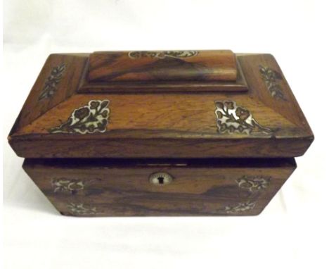 A 19th Century Rosewood Tea Caddy of sarcophagus form, inlaid with panels of Mother of Pearl foliage, (some losses), the lift