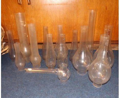 A Large Mixed Lot containing a range of Clear Glass Oil Lamp Chimneys in a range of sizes and designs