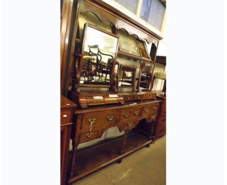 An 18th Century Oak Country Made Dresser, plain plate rack over base with three drawers and two shorter drawers and dummy cen