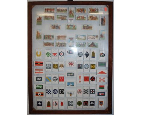 A framed set of Gallagher cigarette cards, British Army badges, and a quantity of framed Player's cigarette cards
