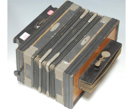 An early 20th century Regal Melodion piano accordion 